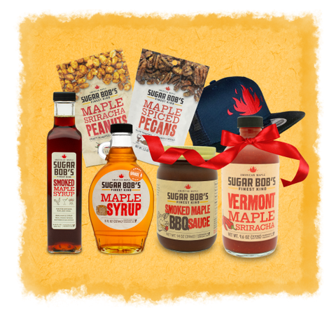 Collection of Sugar Bob's maple syrup and related products on a yellow background