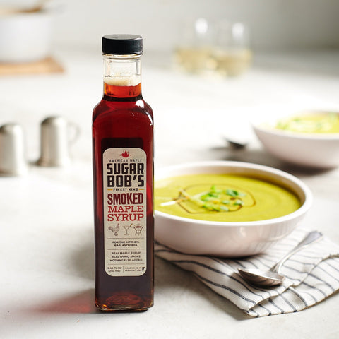 A bottle of kale and Parsnip Soup with Smoked Maple Syrup