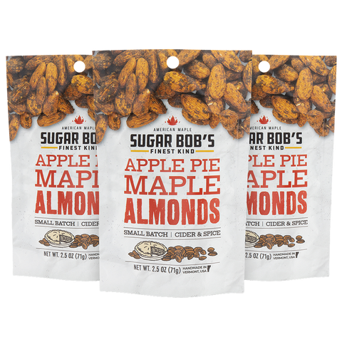 Three packages of Sugar Bob's Apple Pie Maple Almonds on a white background.