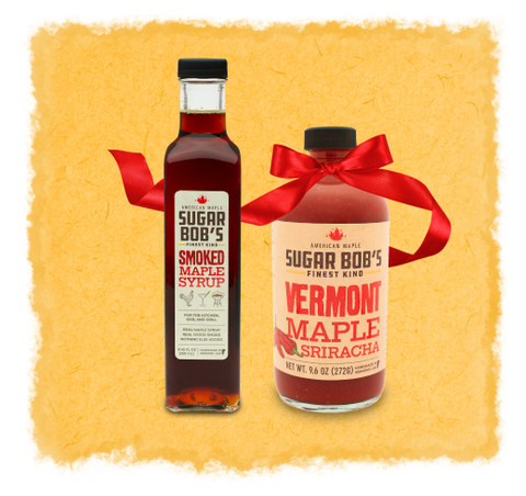 Two bottles of Sugar Bob's maple syrup products on a textured yellow background