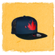 Black cap with red flame design on a textured yellow background